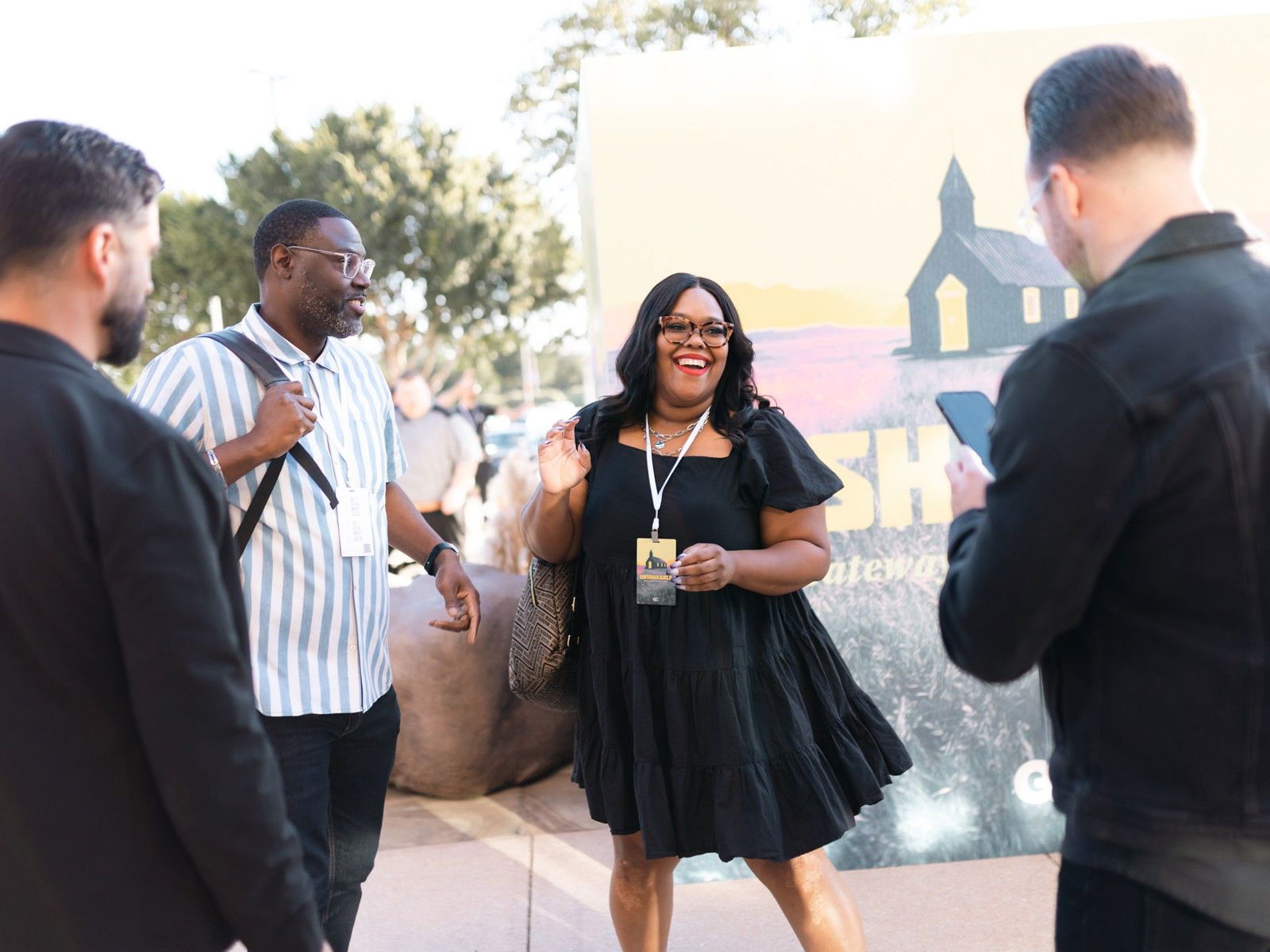 Woman smiling talking to a group